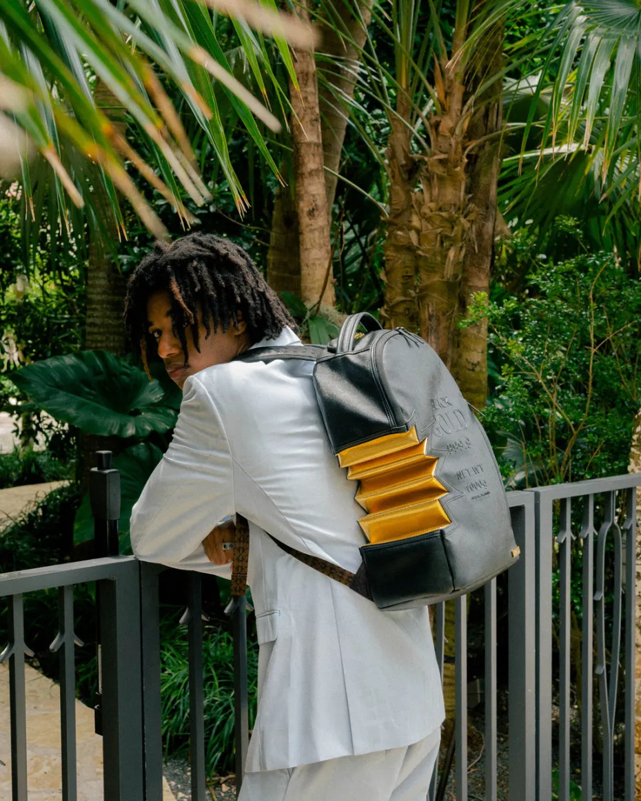 A.i.3 SHARK BITE BLACK GOLD BACKPACK (DLXV)