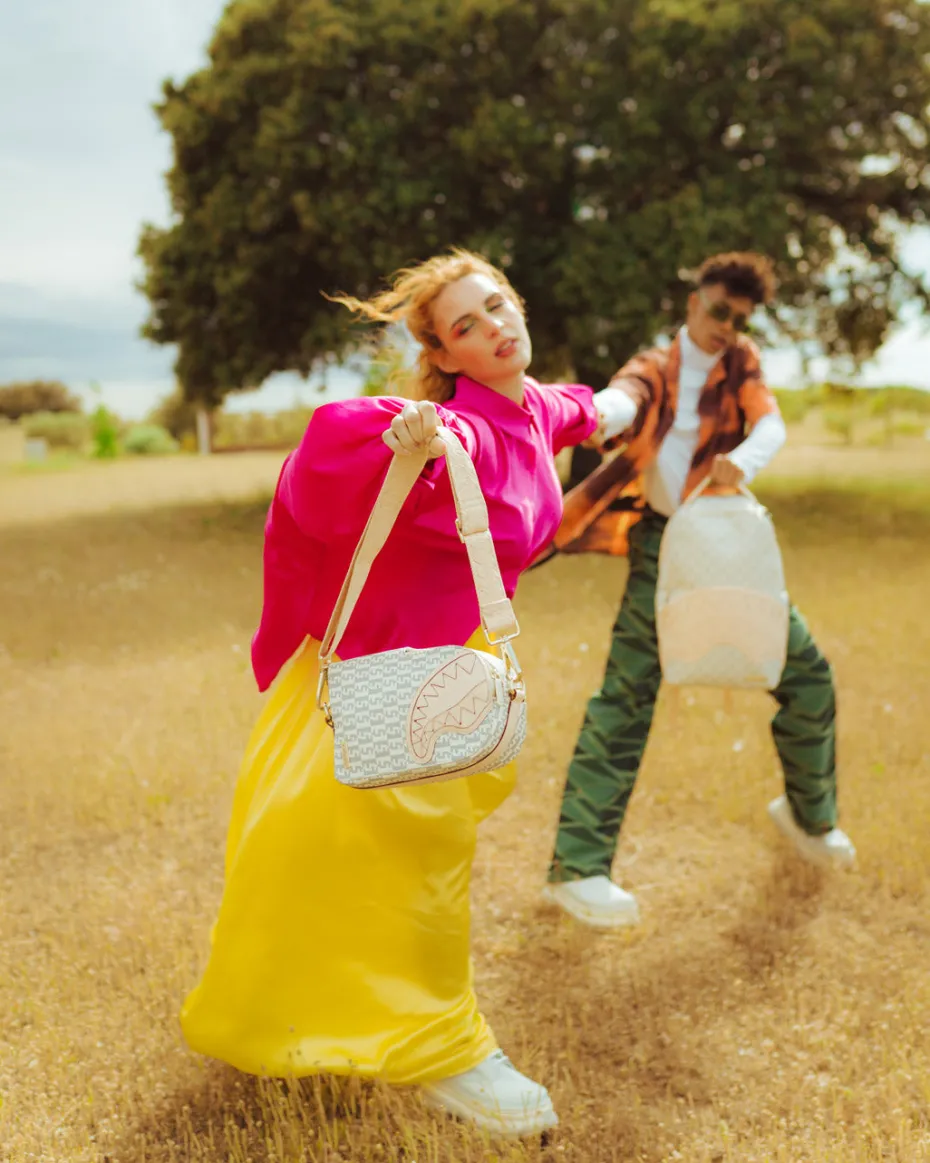 CRÈME DE LA CRÈME BACKPACK SLING