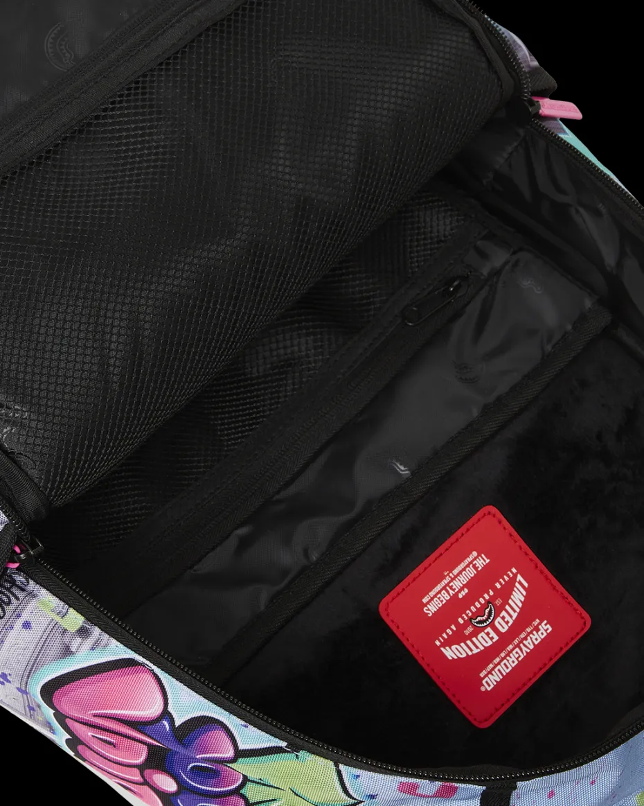 KARMA'S WORLD TURN UP THE VOLUME BACKPACK