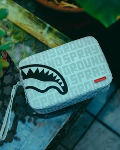 SPLIT THE CHECK (PEARL) TOILETRY BAG